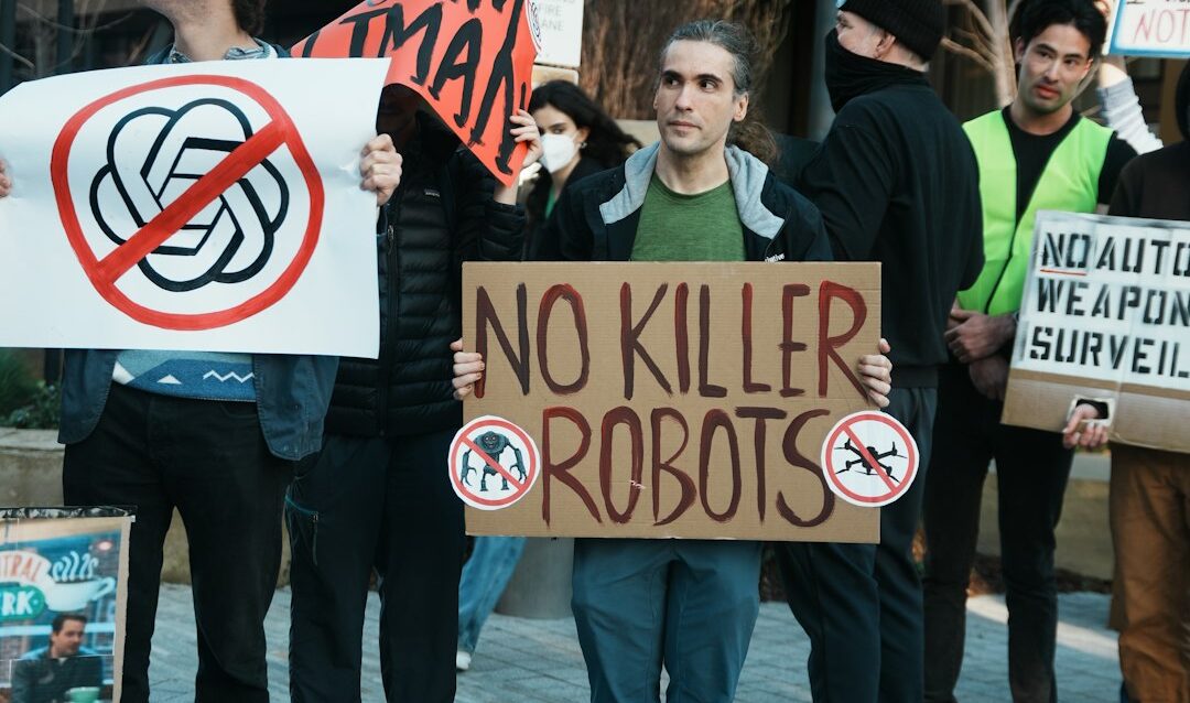 featured-5b44b05418 Protesters hold signs against killer robots and ai.
