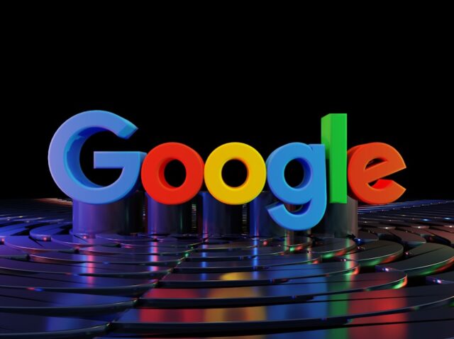the google logo is displayed in front of a black background