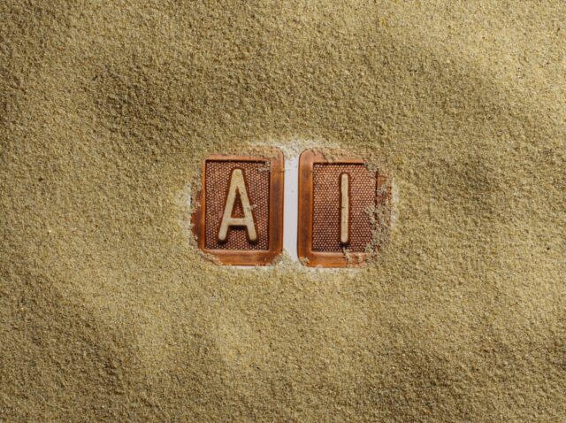 A close up of a word written in sand