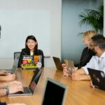 people in a meeting discussing app development