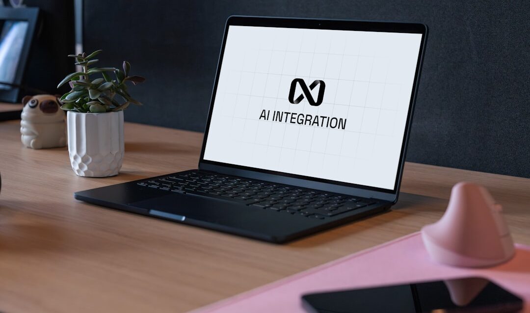 featured-801f289928 Laptop displaying ai integration logo on desk
